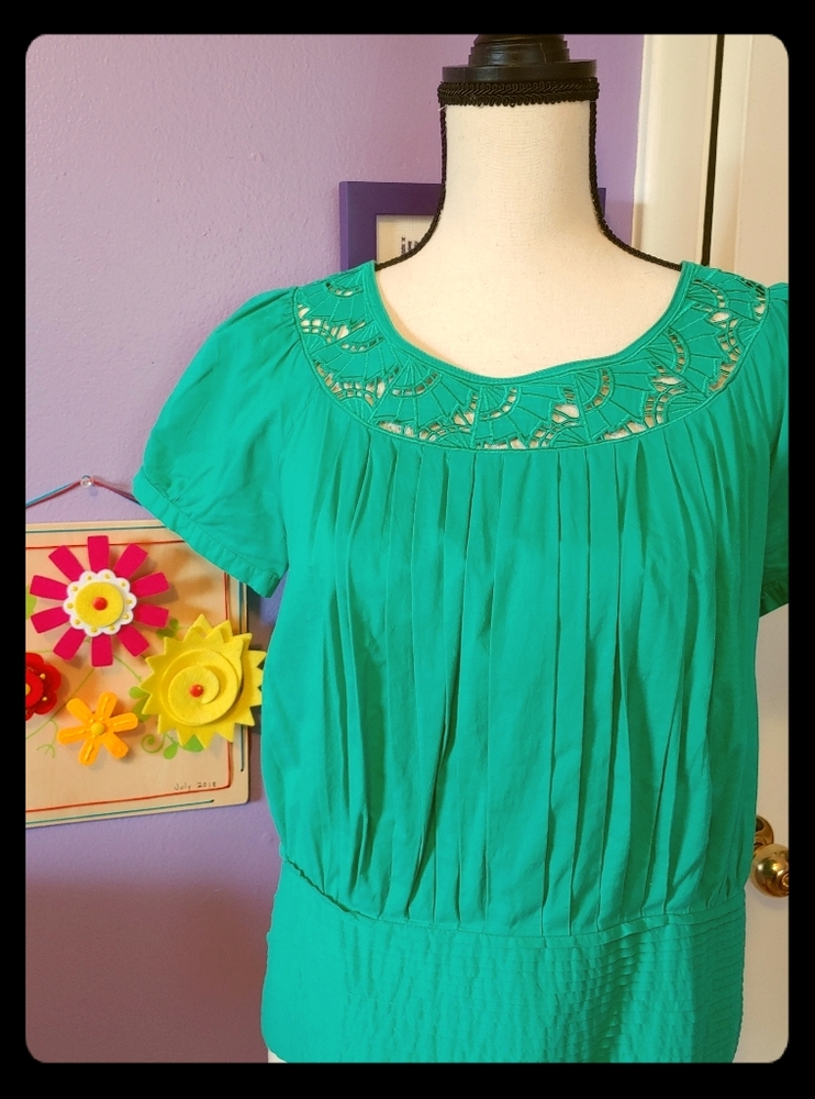 Cut-out neckline blouse